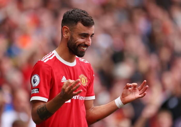 MANCHESTER, ENGLAND - AUGUST 14: Bruno Fernandes of Manchester United celebrates after scoring a goal during the Premier League match between Manchester United  and  Leeds United at Old Trafford on August 14, 2021 in Manchester, England. (Photo by Catherine Ivill/Getty Images,)