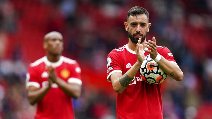 Manchester Uniteds Bruno Fernandes reacts following the English Premier League soccer match between Manchester United and Leeds United at Old Trafford in Manchester, England, Saturday, Aug. 14, 2021. (AP Photo/Jon Super)