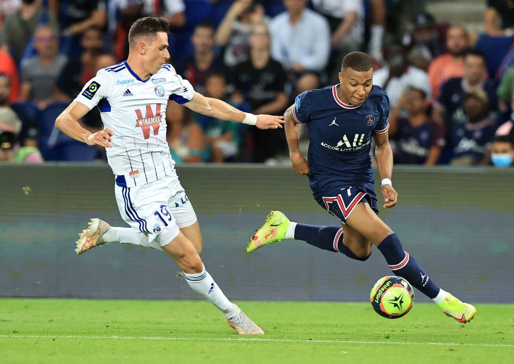 PARIS, FRANCE - AUGUST 14: Kylian Mbappe of Paris Saint-Germain reacts  during the Ligue 1 Uber Eats match between Paris Saint Germain and Strasbourg at Parc des Princes on August 14, 2021 in Paris, France. (Photo by David Rogers/Getty Images)