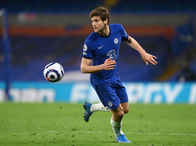 LONDON, ENGLAND - AUGUST 14: Marcos Alonso of Chelsea celebrates with teammate Mason Mount after scoring their side's first goal during the Premier League match between Chelsea and Crystal Palace at Stamford Bridge on August 14, 2021 in London, England. (Photo by Henry Browne/Getty Images)