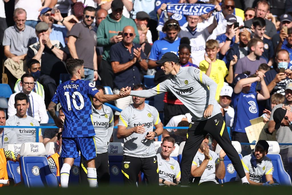 LONDON, ENGLAND - AUGUST 14: Thomas Tuchel, Manager of Chelsea interacts with Christian Pulisic of Chelsea as he is substituted off during the Premier League match between Chelsea and Crystal Palace at Stamford Bridge on August 14, 2021 in London, England. (Photo by Eddie Keogh/Getty Images)