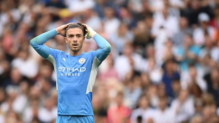 LONDON, ENGLAND - AUGUST 15: Jack Grealish of Manchester City looks dejected during the Premier League match between Tottenham Hotspur  and  Manchester City at Tottenham Hotspur Stadium on August 15, 2021 in London, England. (Photo by Michael Regan/Getty Images)