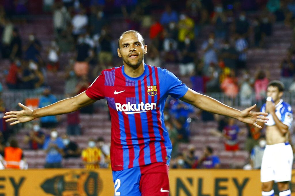 Barcelona's Martin Braithwaite celebrates after scoring his side's third goal during a Spanish La Liga soccer match between Barcelona and Real Sociedad at Camp Nou stadium in Barcelona, Spain, Sunday, Aug. 15, 2021. (AP Photo/Joan Monfort)