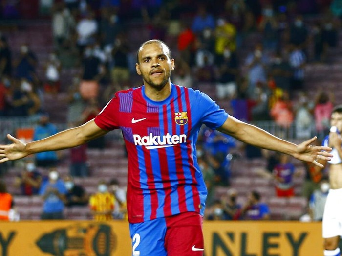 Barcelona's Martin Braithwaite celebrates after scoring his side's third goal during a Spanish La Liga soccer match between Barcelona and Real Sociedad at Camp Nou stadium in Barcelona, Spain, Sunday, Aug. 15, 2021. (AP Photo/Joan Monfort)