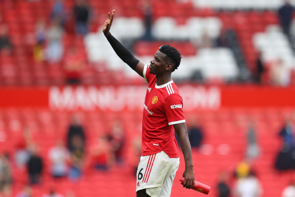 MANCHESTER, ENGLAND - AUGUST 14: Paul Pogba of Manchester United acknowledges the fans following victory in the Premier League match between Manchester United and Leeds United at Old Trafford on August 14, 2021 in Manchester, England. (Photo by Catherine Ivill/Getty Images,)