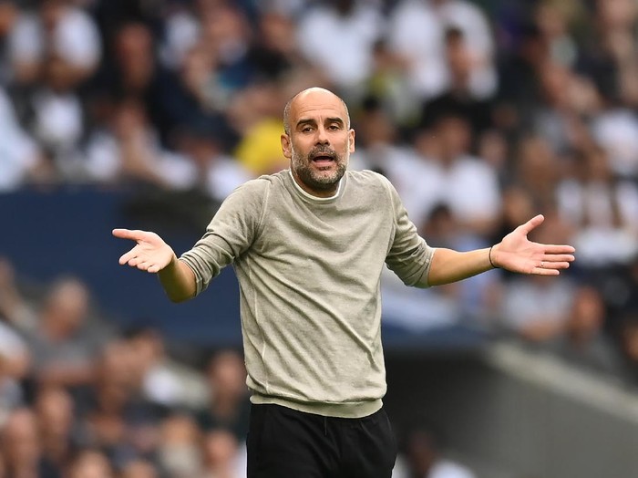 LONDON, ENGLAND - AUGUST 15: Manchester City manager Pep Guardiola gestures during the Premier League match between Tottenham Hotspur  and  Manchester City at Tottenham Hotspur Stadium on August 15, 2021 in London, England. (Photo by Michael Regan/Getty Images)