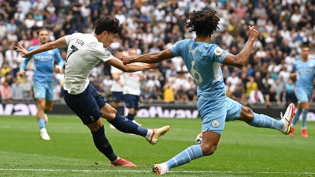 LONDON, ENGLAND - AUGUST 15: Heung-Min Son of Tottenham Hotspur scores their side's first goal during the Premier League match between Tottenham Hotspur and Manchester City at Tottenham Hotspur Stadium on August 15, 2021 in London, England. (Photo by Shaun Botterill/Getty Images)