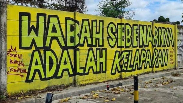 Mural bertuliskan 'Wabah Sebenarnya Adalah Kelaparan' juga muncul di Kota Banjarmasin, Kalimantan Selatan (Kalsel). Mural tersebut telah dihapus Satpol PP. (dok Istimewa)