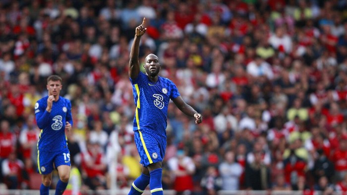 Chelseas Romelu Lukaku celebrates after scoring his sides opening goal during the English Premier League soccer match between Arsenal and Chelsea at the Emirates stadium in London, England, Sunday, Aug. 22, 2021. (AP Photo/Ian Walton)