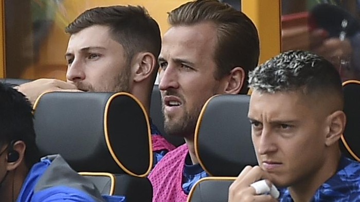 Tottenham’s Harry Kane, back row, 2nd right, sits on the bench during the English Premier League soccer match between Wolverhampton Wanderers and Tottenham Hotspur at Molineux stadium in Wolverhampton, England, Sunday, Aug. 22, 2021. (AP Photo/Rui Vieira)