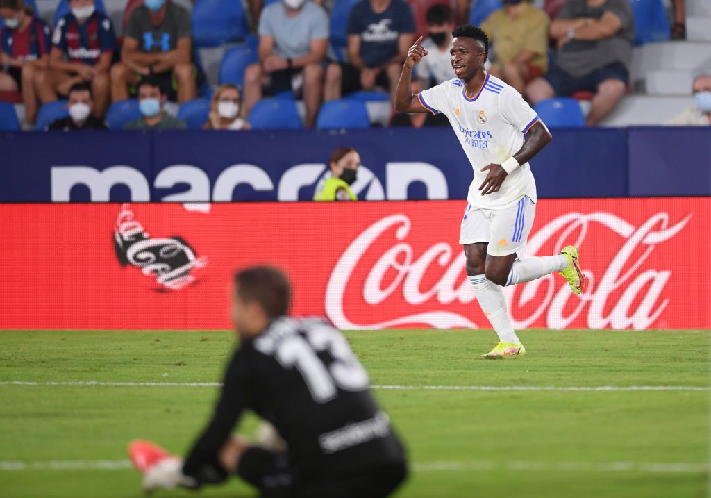 VALENCIA, SPAIN - AUGUST 22: Vinicius Junior of Real Madrid celebrates after scoring their team's second goal during the LaLiga Santander match between Levante UD and Real Madrid CF at Ciutat de Valencia Stadium on August 22, 2021 in Valencia, Spain . (Photo by Aitor Alcalde/Getty Images)