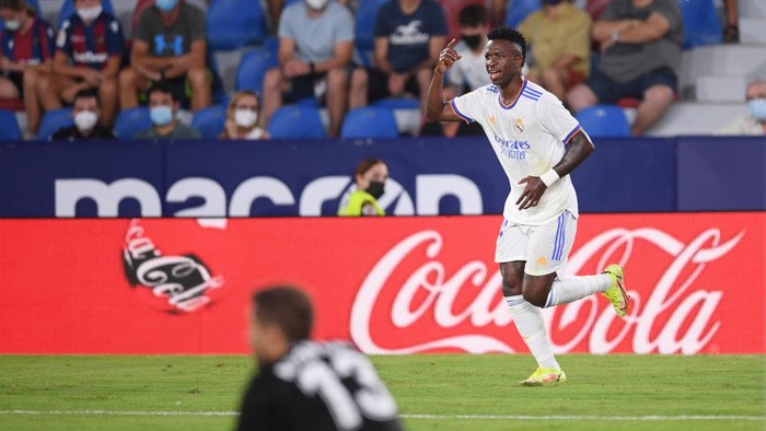 VALENCIA, SPAIN - AUGUST 22: Vinicius Junior of Real Madrid celebrates after scoring their teams second goal during the LaLiga Santander match between Levante UD and Real Madrid CF at Ciutat de Valencia Stadium on August 22, 2021 in Valencia, Spain . (Photo by Aitor Alcalde/Getty Images)