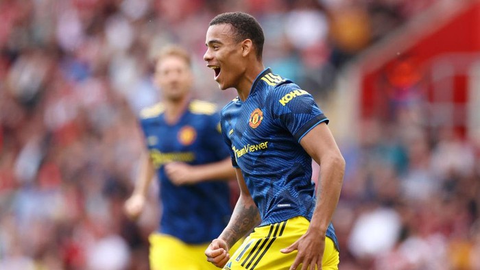 SOUTHAMPTON, ENGLAND - AUGUST 22: Mason Greenwood of Manchester United celebrates after scoring their sides first goal during the Premier League match between Southampton and Manchester United at St Marys Stadium on August 22, 2021 in Southampton, England. (Photo by Ryan Pierse/Getty Images)