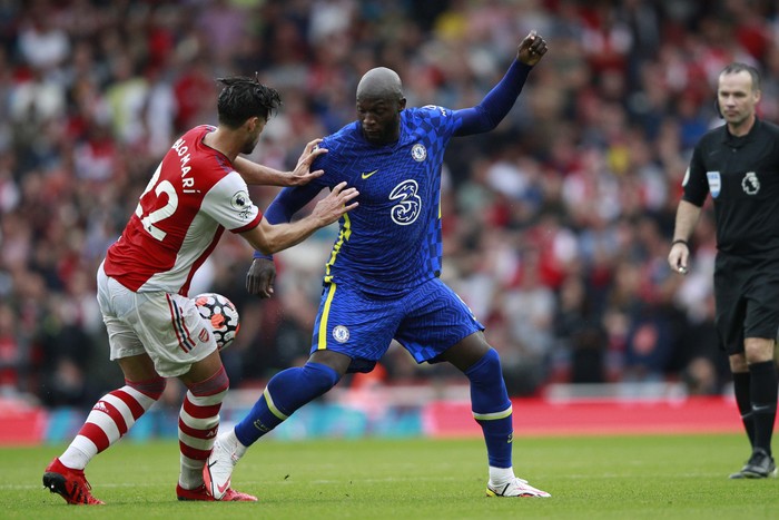 Chelsea's Cesar Azpilicueta, left, Chelsea's Romelu Lukaku, Chelsea's Antonio Rudiger, right, during the English Premier League soccer match between Arsenal and Chelsea at the Emirates stadium in London, England, Sunday, Aug. 22, 2021. (AP Photo/Ian Walton)