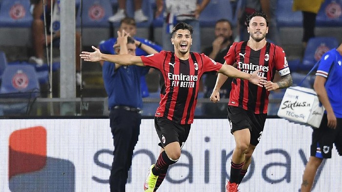 AC Milans Brahim Diaz, center, celebrates after scoring against Sampdoria goalkeeper Emil Audero during a Serie A soccer match at the Luigi Ferraris stadium, in Genoa, Italy, Monday, Aug. 23, 2021. (Tano Pecoraro/LaPresse Via AP)