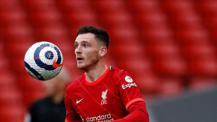 LIVERPOOL, ENGLAND - MAY 23: Andrew Robertson of Liverpool runs with the ball  during the Premier League match between Liverpool and Crystal Palace at Anfield on May 23, 2021 in Liverpool, England. A limited number of fans will be allowed into Premier League stadiums as Coronavirus restrictions begin to ease in the UK. (Photo by Phil Noble - Pool/Getty Images)