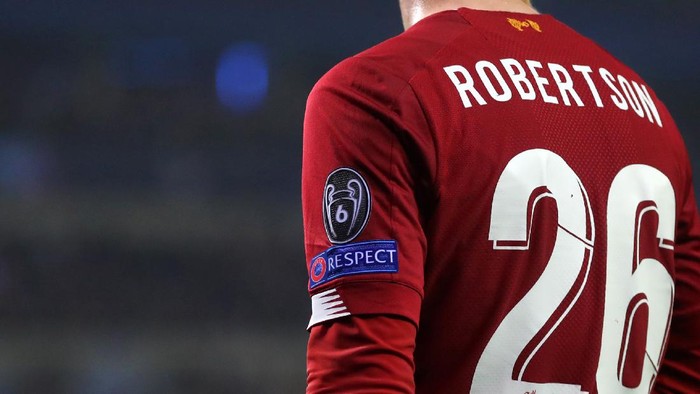 GENK, BELGIUM - OCTOBER 23: Detail view of the Champions League badge with the number 6 on and the Respect logo on the shirt of Andrew Robertson of Liverpool during the UEFA Champions League group E match between KRC Genk and Liverpool FC at Luminus Arena on October 23, 2019 in Genk, Belgium. (Photo by Catherine Ivill/Getty Images)