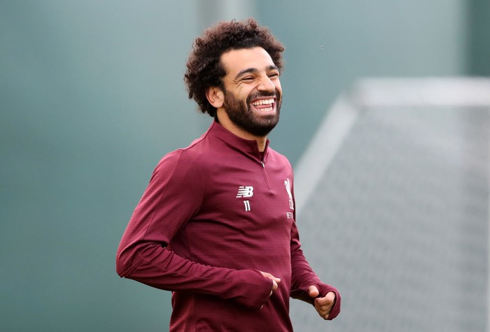 LIVERPOOL, ENGLAND - SEPTEMBER 17:  Mohamed Salah of Liverpool laughs during a Liverpool training session at Melwood Training Ground on September 17, 2018 in Liverpool, England.  (Photo by Mark Robinson/Getty Images)