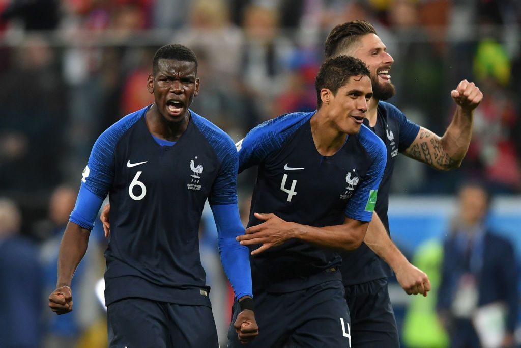 SAINT PETERSBURG, RUSSIA - JULY 10:  Paul Pogba, Raphael Varane and Olivier Giroud of France celebrate victory following the 2018 FIFA World Cup Russia Semi Final match between Belgium and France at Saint Petersburg Stadium on July 10, 2018 in Saint Petersburg, Russia.  (Photo by Shaun Botterill/Getty Images)