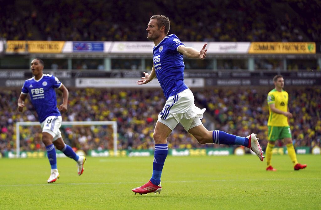 Leicester City's Jamie Vardy celebrates scoring their side's first goal of the game during the English Premier League soccer match between Norwich City and Leicester City at Carrow Road, Norwich, England, Saturday, Aug. 28, 2021. (Joe Giddens/PA via AP)