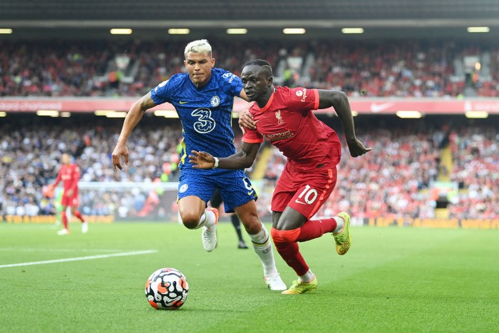 LIVERPOOL, ENGLAND - AUGUST 28: Sadio Mane of Liverpool battles for possession with Thiago Silva of Chelsea during the Premier League match between Liverpool  and  Chelsea at Anfield on August 28, 2021 in Liverpool, England. (Photo by Michael Regan/Getty Images)