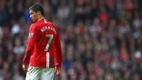 Cristiano Ronaldo resmi kembali ke Manchester United. Setan Merah mengumumkan telah menyepakati transfer bintang Portugal itu dengan Juventus. MU diketahui membeli Ronaldo dari Juventus seharga 25 juta Euro atau sekitar Rp 423 miliar. Getty Images/Laurence Griffiths.