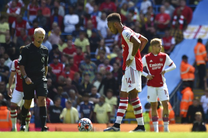 Arsenals Pierre-Emerick Aubameyang is dejected after Manchester City scored their third goal during the English Premier League soccer match between Manchester City and Arsenal at Etihad stadium in Manchester, England, Saturday, Aug. 28, 2021. (AP Photo/Rui Vieira)