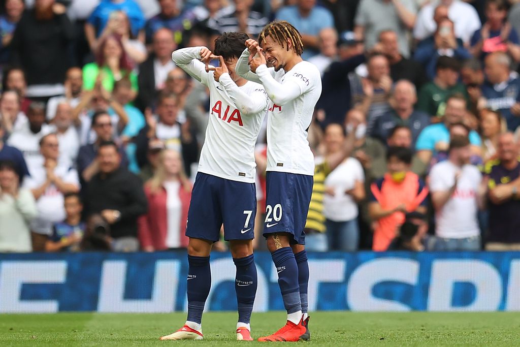 LONDON, ENGLAND - AUGUST 29: Heung-Min Son of Tottenham Hotspur celebrates after scoring their sides first goal with team mate Dele Alli during the Premier League match between Tottenham Hotspur and Watford at Tottenham Hotspur Stadium on August 29, 2021 in London, England. (Photo by Catherine Ivill/Getty Images)