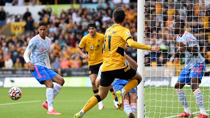 WOLVERHAMPTON, ENGLAND - AUGUST 29: Francisco Trincao of Wolverhampton Wanderers has a shot on goal during the Premier League match between Wolverhampton Wanderers  and  Manchester United at Molineux on August 29, 2021 in Wolverhampton, England. (Photo by Michael Regan/Getty Images)