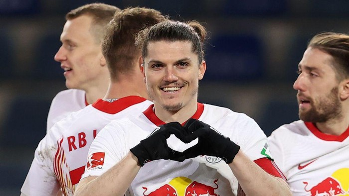BIELEFELD, GERMANY - MARCH 19: Marcel Sabitzer of Leipzig celebrates scoring the opening goal during the Bundesliga match between DSC Arminia Bielefeld and RB Leipzig at Schueco Arena on March 19, 2021 in Bielefeld, Germany. (Photo by Lars Baron/Getty Images)