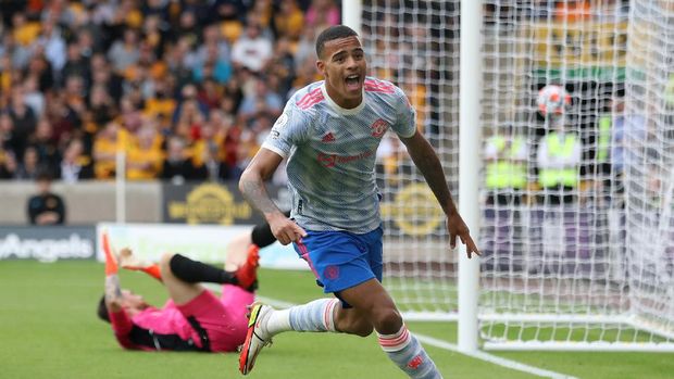 Soccer Football - Premier League - Wolverhampton Wanderers v Manchester United - Molineux Stadium, Wolverhampton, Britain - August 29, 2021 Manchester United's Mason Greenwood celebrates scoring their first goal Action Images via Reuters/Carl Recine EDITORIAL USE ONLY. No use with unauthorized audio, video, data, fixture lists, club/league logos or 'live' services. Online in-match use limited to 75 images, no video emulation. No use in betting, games or single club /league/player publications.  Please contact your account representative for further details.
