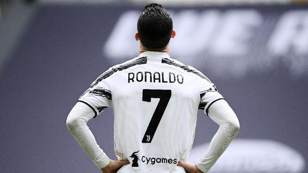 Juventus' Cristiano Ronaldo looks on during a Serie A soccer match between Juventus and Genoa, at the Turin Allianz stadium, Italy, Sunday, April 11, 2021. Ronaldo is headed back to Manchester United. The English club said Friday, Aug. 27, 2021, it has reached an agreement with Juventus for the transfer of the 36-year-old Portugal forward, subject to agreement of personal terms, visa and a medical examination. (Marco Alpozzi/LaPresse via AP)