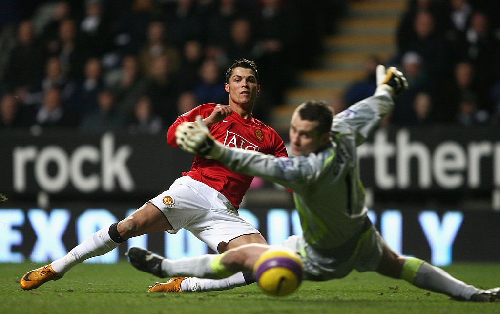 NEWCASTLE, UNITED KINGDOM - FEBRUARY 23:  Cristiano Ronaldo of Manchester United scores his team's second goal during the Barclays Premier League match between Newcastle United and Manchester United at St James' Park on February 23, 2008 in Newcastle, England. (Photo by Clive Brunskill/Getty Images)