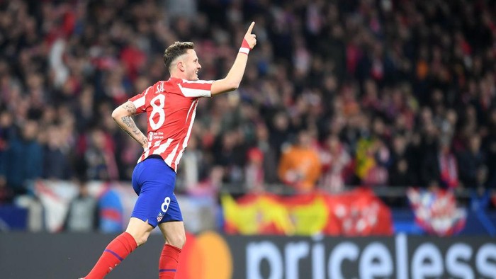 MADRID, SPAIN - FEBRUARY 18: Saul Niguez of Atletico Madrid celebrates after scoring his teams first goal during the UEFA Champions League round of 16 first leg match between Atletico Madrid and Liverpool FC at Wanda Metropolitano on February 18, 2020 in Madrid, Spain. (Photo by Michael Regan/Getty Images)