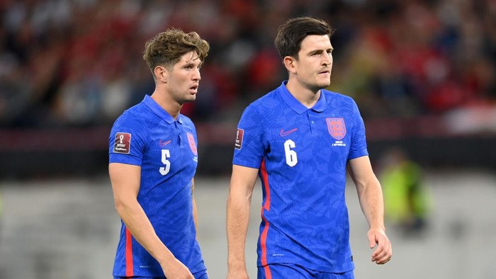 BUDAPEST, HUNGARY - SEPTEMBER 02: John Stones and Harry Maguire of England  look on  during the 2022 FIFA World Cup Qualifier match between Hungary and England at Stadium Puskas Ferenc on September 02, 2021 in Budapest, Hungary. (Photo by Michael Regan/Getty Images)