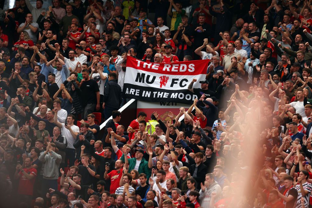 MANCHESTER, ENGLAND - AUGUST 14: General view inside the stadium as Manchester United celebrate during the Premier League match between Manchester United  and  Leeds United at Old Trafford on August 14, 2021 in Manchester, England. (Photo by Catherine Ivill/Getty Images,)