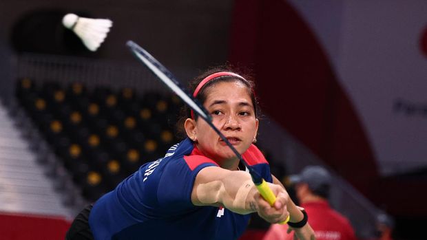 Tokyo 2020 Paralympic Games - Badminton - Women's Singles SL4 Gold Medal Match - Yoyogi National Stadium, Tokyo, Japan - September 5, 2021. Leani Ratri Oktila of Indonesia in action against Hefang Cheng of China. REUTERS/Athit Perawongmetha