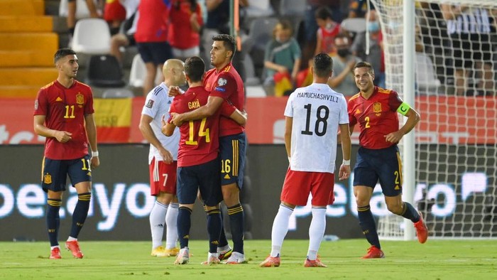 SEVILLE, SPAIN - SEPTEMBER 05: Jose Gaya of Spain celebrates with Rodri  after scoring their teams first goal during the 2022 FIFA World Cup Qualifier match between Spain and Georgia at Estadio de La Cartuja on September 05, 2021 in Seville, . (Photo by David Ramos/Getty Images)