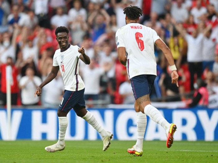 LONDON, ENGLAND - SEPTEMBER 05: Bukayo Saka of England celebrates after scoring their teams fourth goal  during the 2022 FIFA World Cup Qualifier match between England and Andorra at Wembley Stadium on September 05, 2021 in London, England. (Photo by Shaun Botterill/Getty Images)