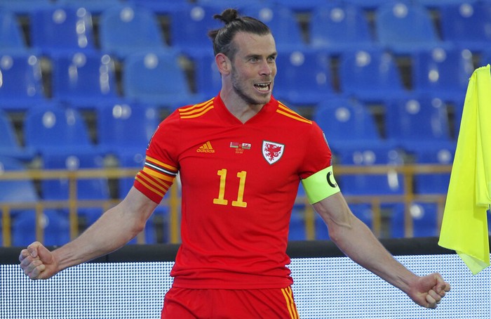 Wales Gareth Bale celebrates after scoring against Belarus during the World Cup 2022 qualifying Group E soccer match between Belarus and Wales at the Centralny Stadium in Kazan, Russia, Sunday, Sept. 5, 2021. (AP Photo/Alexey Nasyrov).