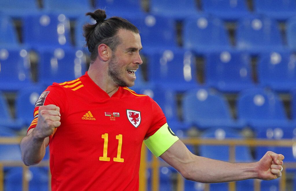 Wales' Gareth Bale celebrates after scoring against Belarus during the World Cup 2022 qualifying Group E soccer match between Belarus and Wales at the Centralny Stadium in Kazan, Russia, Sunday, Sept. 5, 2021. (AP Photo/Alexey Nasyrov).