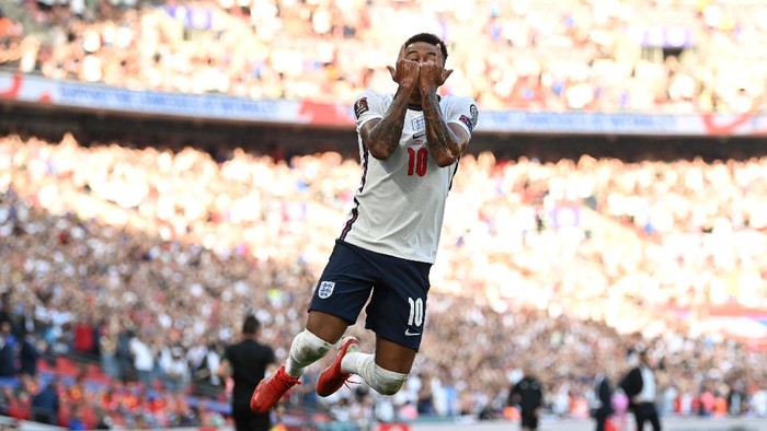 LONDON, ENGLAND - SEPTEMBER 05: Jesse Lingard of England  celebrates after scoring their teams first goal  during the 2022 FIFA World Cup Qualifier match between England and Andorra at Wembley Stadium on September 05, 2021 in London, England. (Photo by Shaun Botterill/Getty Images)