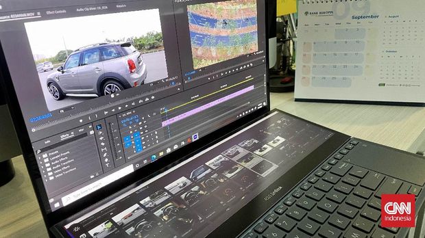 Ilustrasi penggunaan Asus Zenbook Pro Duo untuk video editing dengan memanfaatkan fitur screepad.