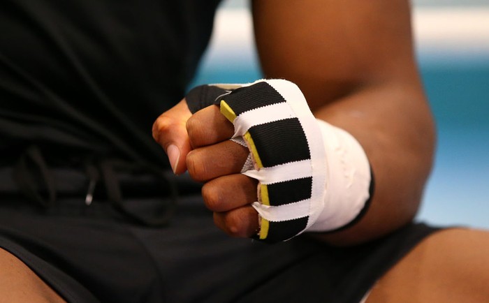SHEFFIELD, ENGLAND - MAY 01: A detail shot of Anthony Joshuas fist is seen as he tapes up prior to a training session during the Anthony Joshua Media Day at the English Institute of Sport on May 01, 2019 in Sheffield, England. (Photo by Alex Livesey/Getty Images)