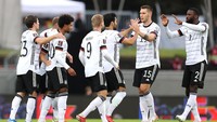 Sementara itu, Jerman jadi tim pertama yang lolos ke Piala Dunia 2022 usai kalahkan Makedonia Utara 4-0. Laga ini juga jadi misi balas dendam untuk Jerman yang kalah lawan Makedonia Utara tahun lalu dengan skor 2-3. Getty Images/Alex Grimm.