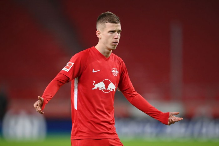 STUTTGART, GERMANY - JANUARY 02: Dani Olmo of RB Leipzig reacts during the Bundesliga match between VfB Stuttgart and RB Leipzig at Mercedes-Benz Arena on January 02, 2021 in Stuttgart, Germany. Sporting stadiums around Germany remain under strict restrictions due to the Coronavirus Pandemic as Government social distancing laws prohibit fans inside venues resulting in games being played behind closed doors. (Photo by Matthias Hangst/Getty Images)