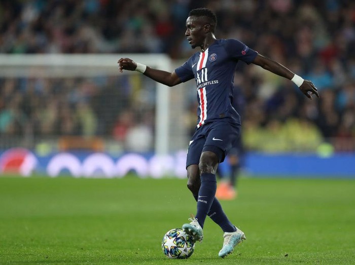 MADRID, SPAIN - NOVEMBER 26: Idrissa Gueye of Paris Saint-Germain runs with the ball during the UEFA Champions League group A match between Real Madrid and Paris Saint-Germain at Bernabeu on November 26, 2019 in Madrid, Spain. (Photo by Angel Martinez/Getty Images)