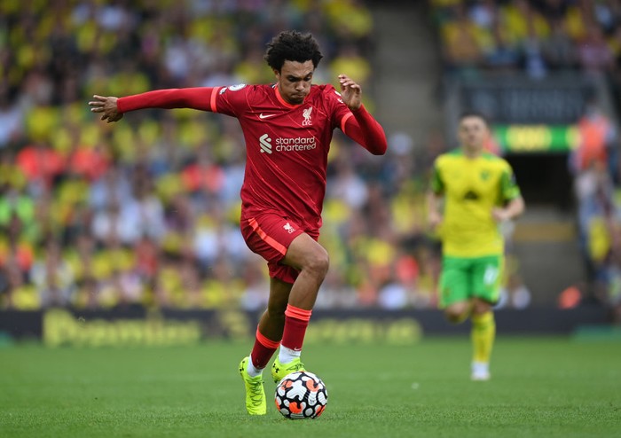 NORWICH, ENGLAND - AUGUST 14:  Trent Alexander-Arnold of Liverpool runs with the ball during the Premier League match between Norwich City  and  Liverpool at Carrow Road on August 14, 2021 in Norwich, England. (Photo by Shaun Botterill/Getty Images)
