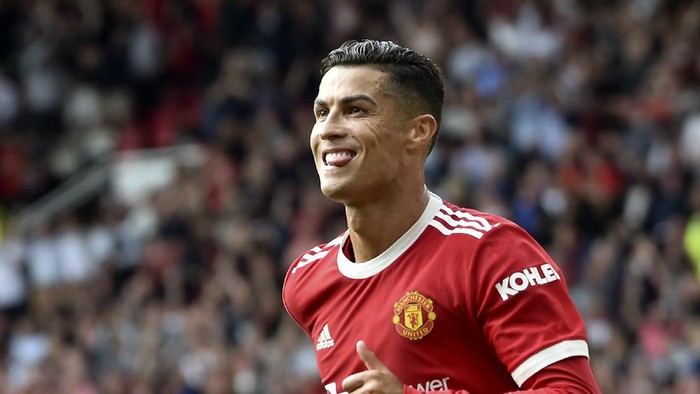 Manchester Uniteds Cristiano Ronaldo celebrates after scoring the opening goal during the English Premier League soccer match between Manchester United and Newcastle United at Old Trafford stadium in Manchester, England, Saturday, Sept. 11, 2021. (AP Photo/Rui Vieira)