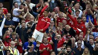 Tak butuh lama bagi Ronaldo untuk nyetel dengan Harry Maguire dkk. Pemain 36 tahun itu langsung menyumbangkan dua gol dalam laga yang dimenangkan Man United 4-1 tersebut. AP Photo/Rui Vieira.